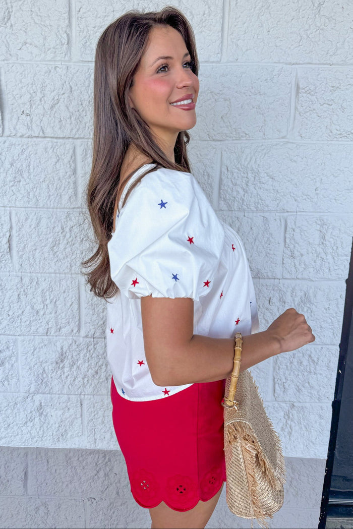 red and blue embroidered star print white relaxed silhouette babydoll top