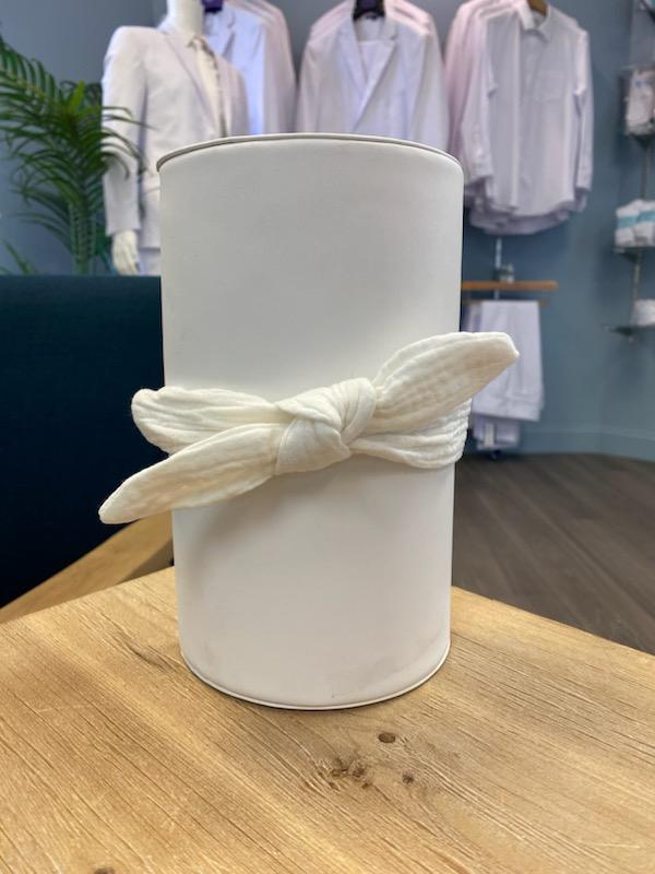 White knotted bow headband.