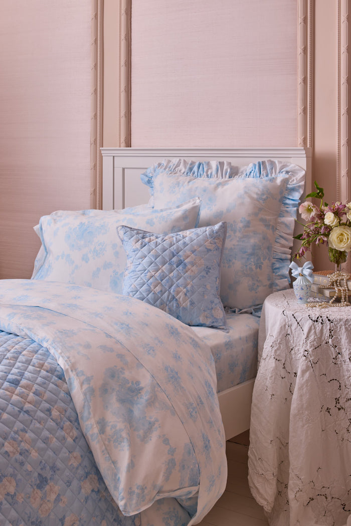 Blue and white ruffled floral plush bedding