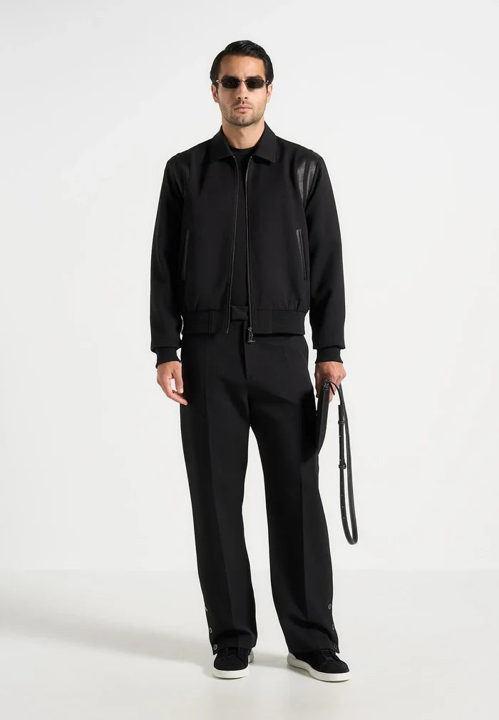 boris-relaxed-fit-tailored-button-cuff-trousers-black