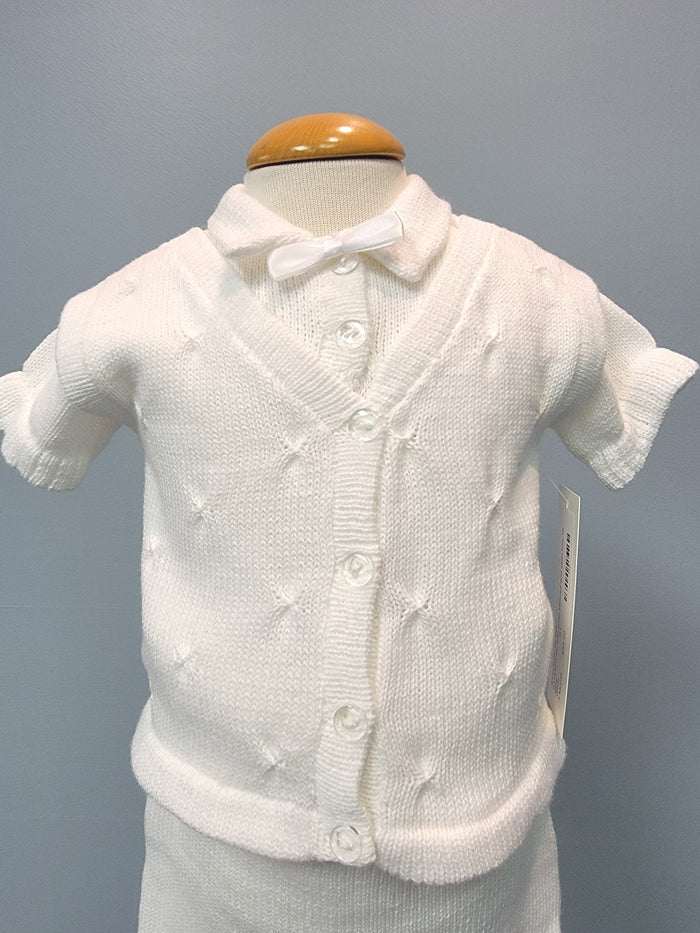 White knit baby boy outfit with bowtie.