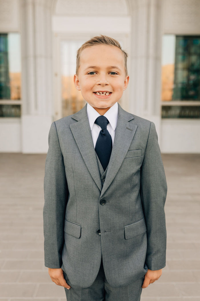 boy in charcoal suit-front view