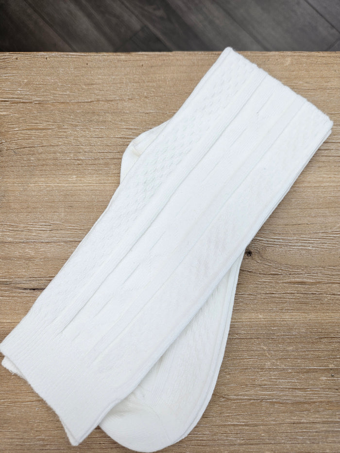 White cable socks.