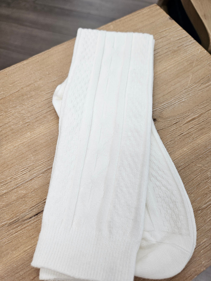 White cable socks.