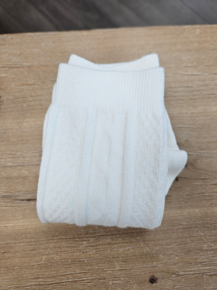White cable socks.