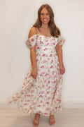 Women’s Off white tiered midi dress with pink floral print and off the shoulder design.