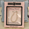 Beaded white baby bracelet.