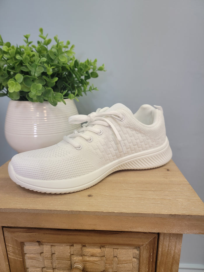 White lace up sneaker for men.