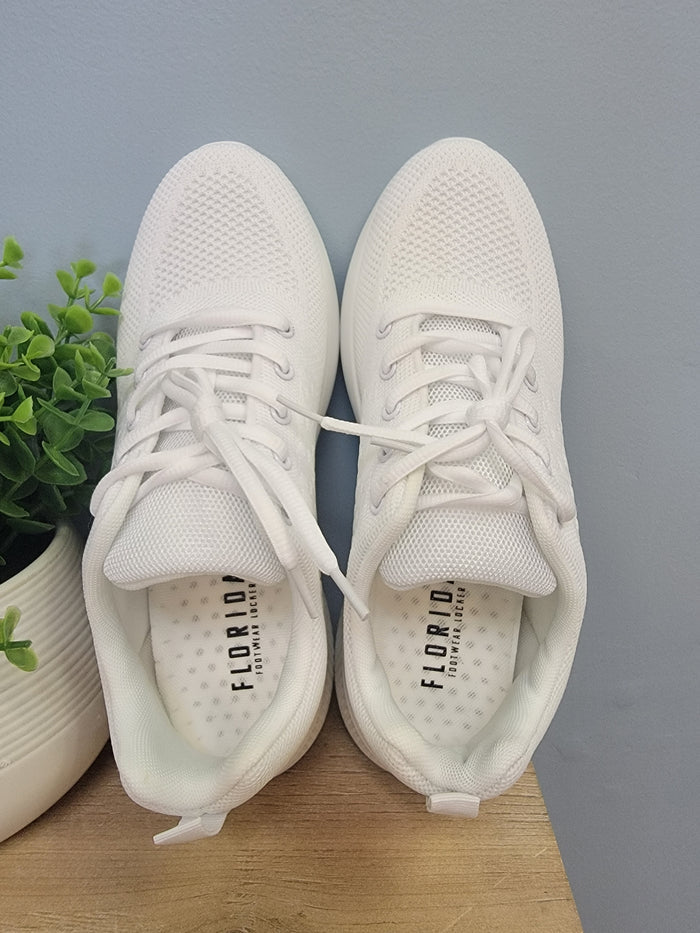 White lace up sneaker for men.