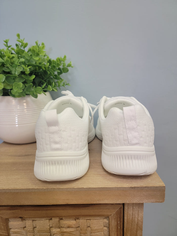 White lace up sneaker for men.