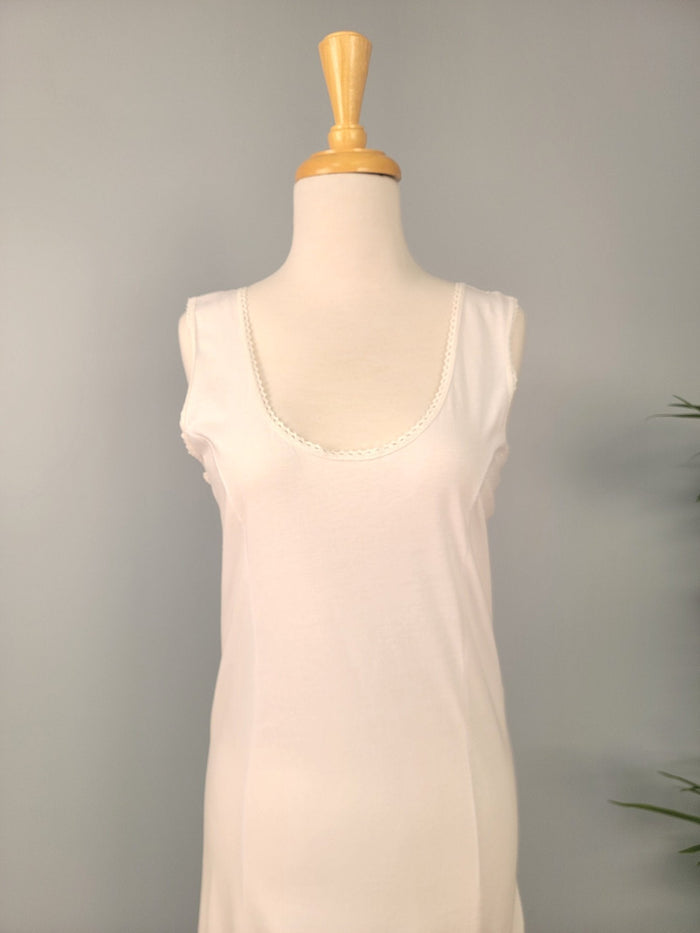 Full length white cotton slip.