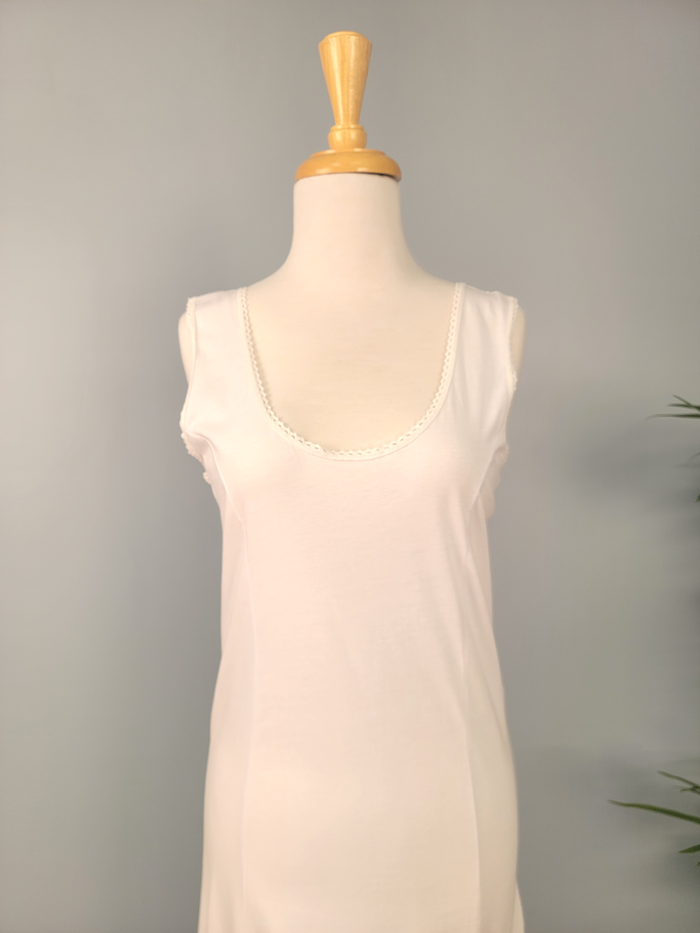 Full length white cotton slip.
