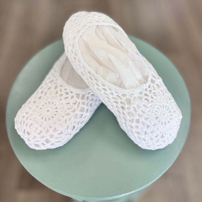 White crochet slippers for women.