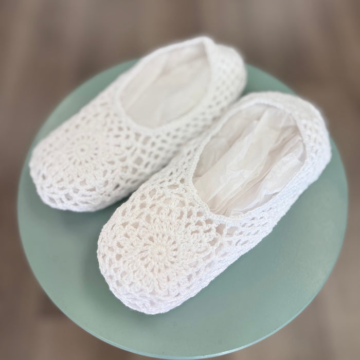 White crochet slippers for women.