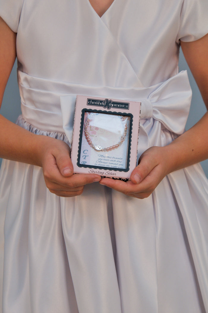 beaded pink pearl CTR bracelet in box.