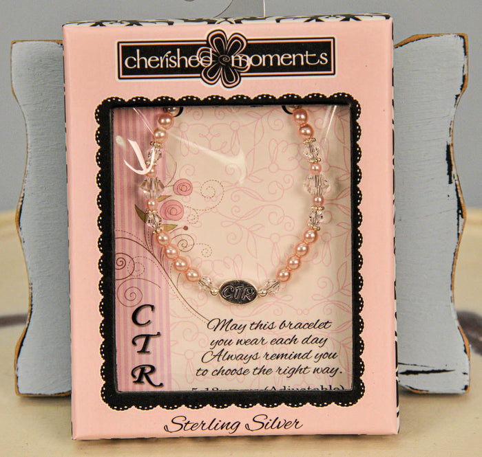 beaded pink pearl CTR bracelet in box.