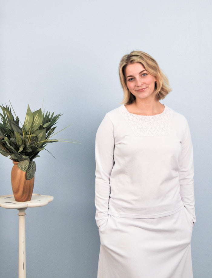 woman in white skirt and shirt