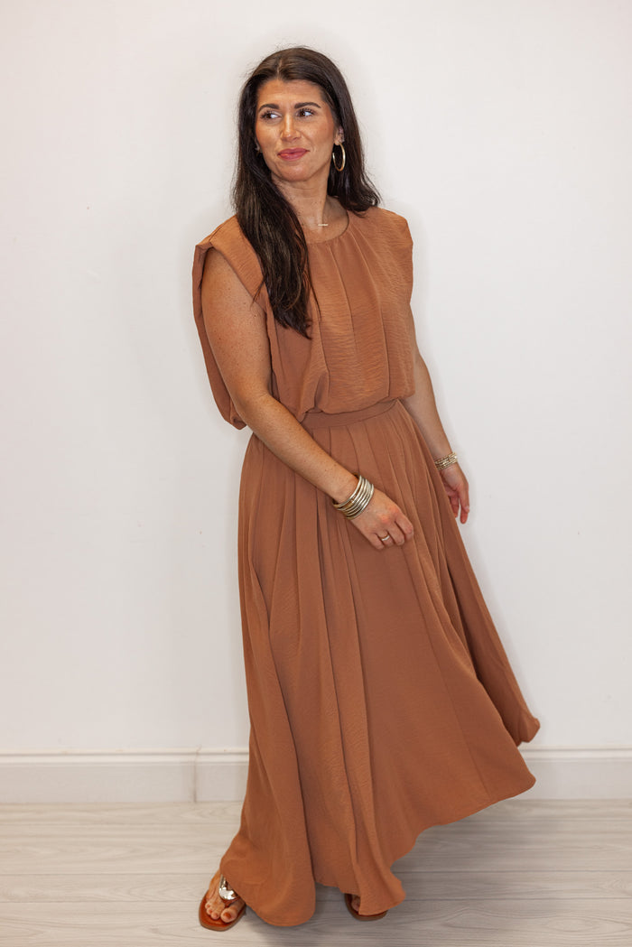women's brown dressy bubble hem top