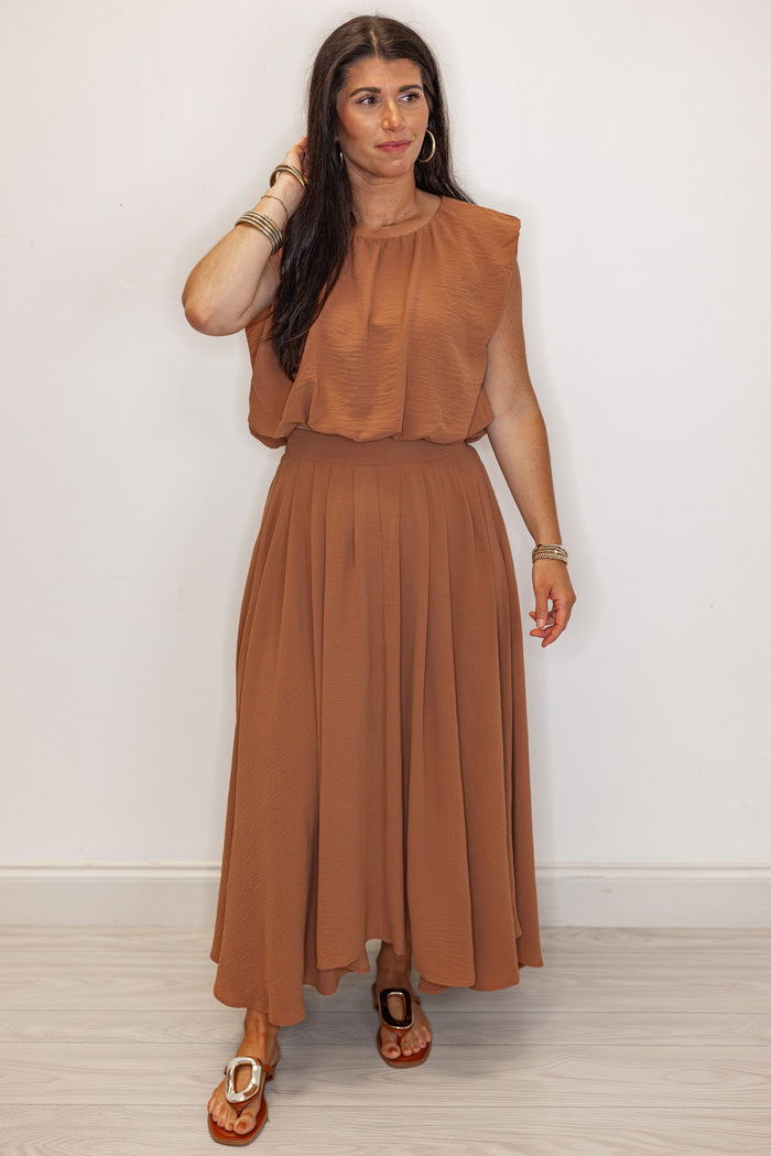 women's brown dressy bubble hem top