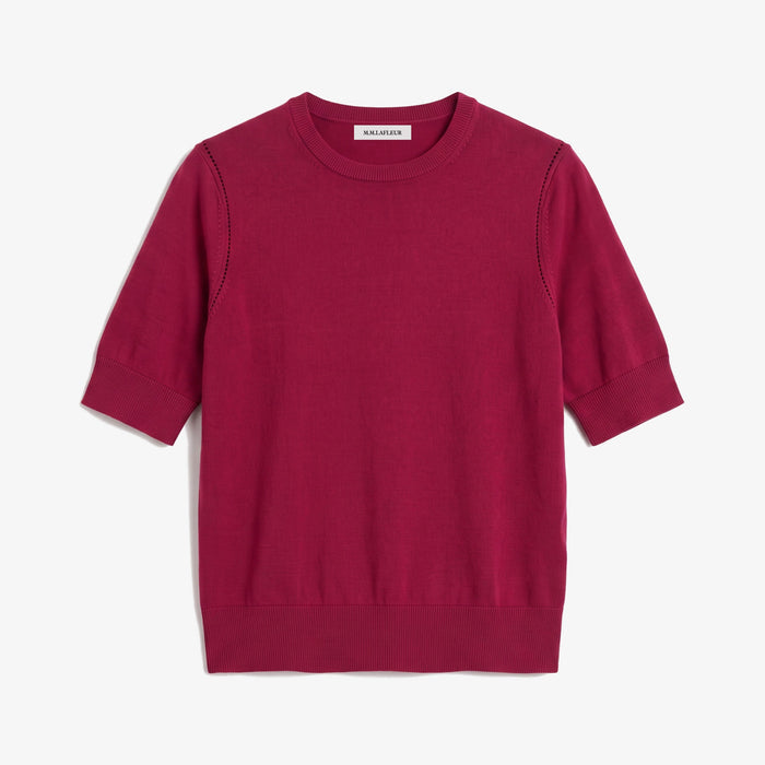 image of a bright raspberry pink colored short sleeve sweater