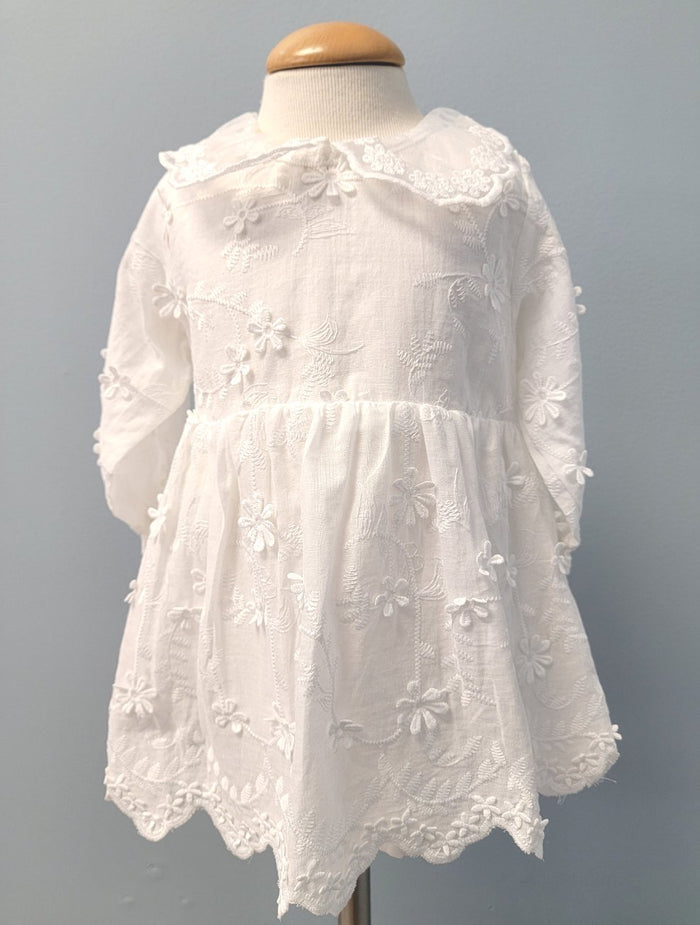 White floral baby dress with collar.