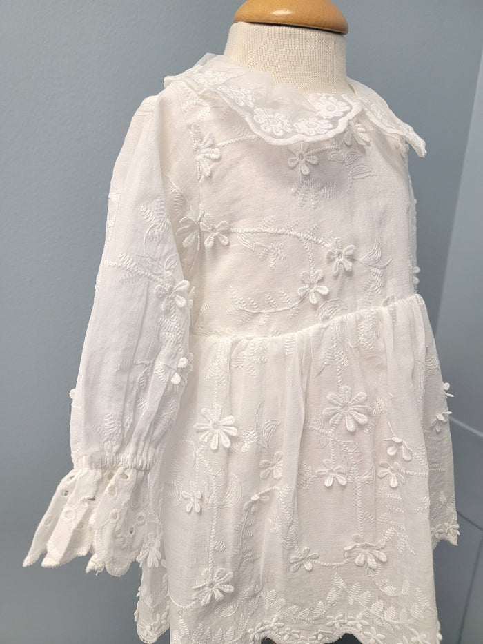 White floral baby dress with collar.