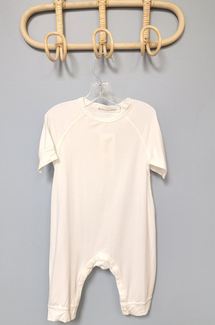 Plain white baby romper.