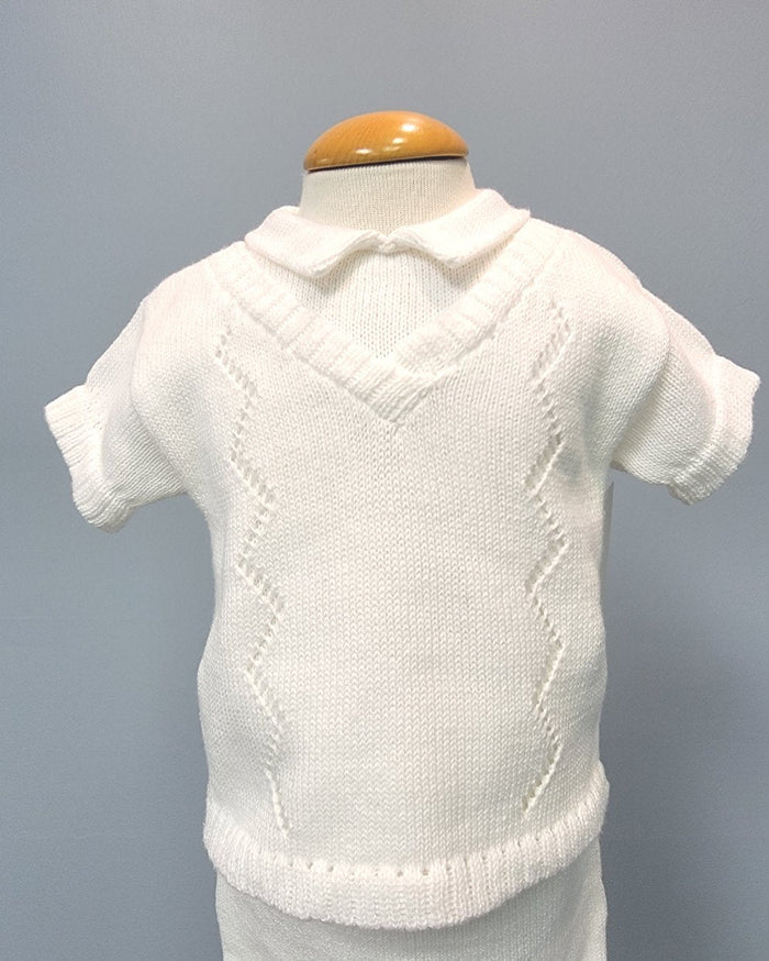 White knit baby boy outfit with vest.