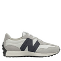 A pair of New Balance kids' running shoes with a gray and black color scheme, featuring a wedge silhouette and 'N' branding on the side.