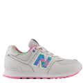 White sneaker with colorful 'N' logo on a light gray background