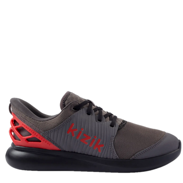 A pair of boys' athletic shoes with a gray upper, red accents, and the brand name 'KIZIK' displayed prominently on the side.