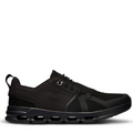 A black athletic shoe designed for big kids with visible cushioning units