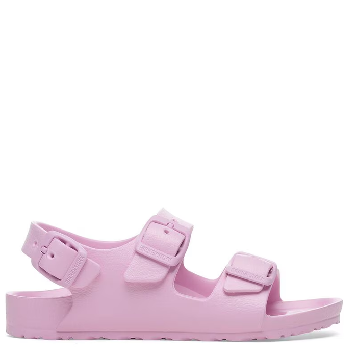 A pink Birkenstock Milano back-strap sandal for kids with three adjustable straps and a cork footbed.