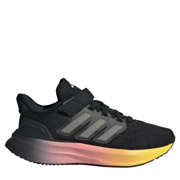 A child's black adidas Ultrabounce sneaker with a hook-and-loop strap and a colorful sole.