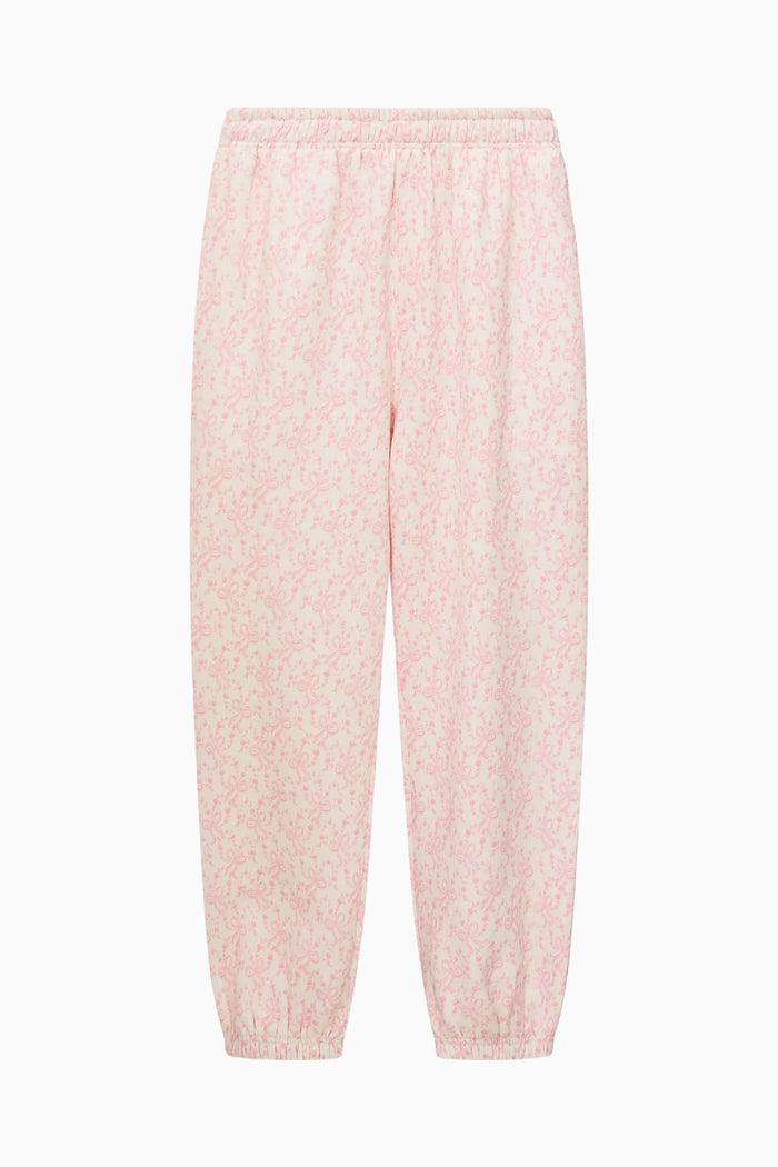 Pink pajama pants on a white background