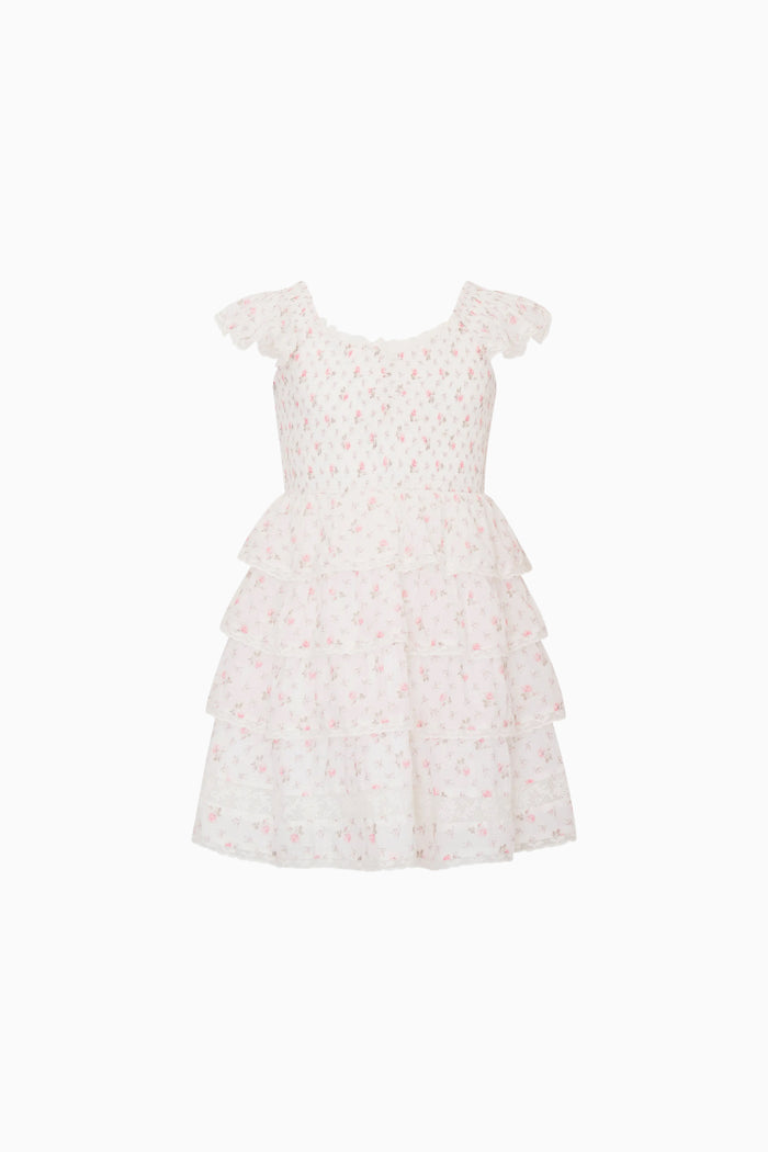 White lace ruffle dress with floral pattern on a white background
