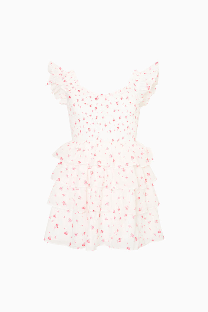 White dress with red floral pattern on a white background