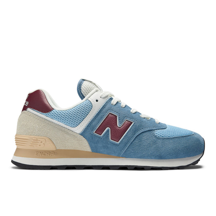 Blue sneaker with maroon accents on a white background