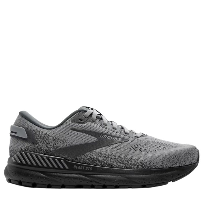 A pair of Brooks Beast GTS 24 running shoes in gray color, featuring a side view of the sneaker with GuideRails support system.