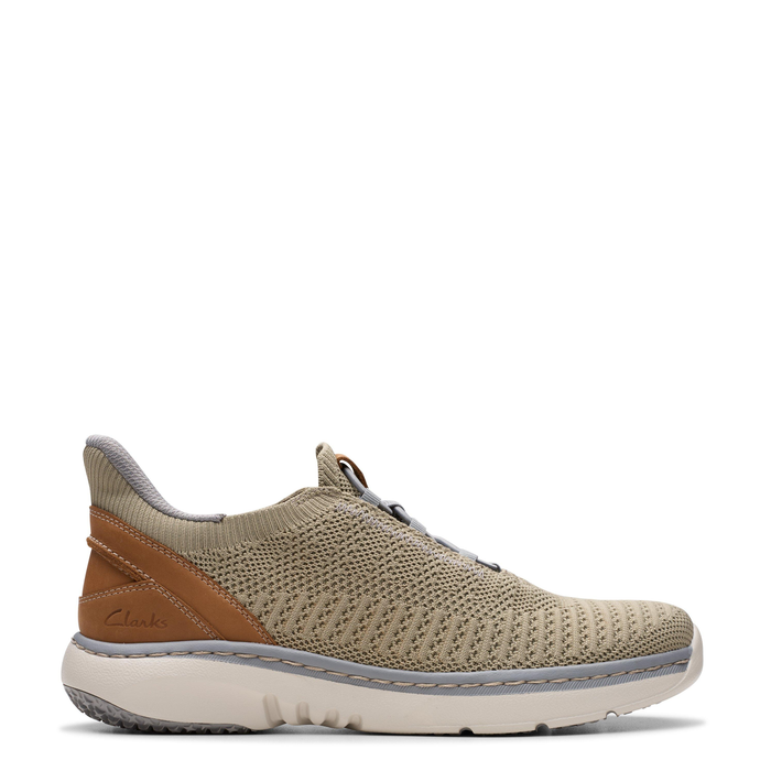 A pair of Clarks men's casual shoes with a navy blue textile upper and brown accents, featuring a lightweight and flexible design.