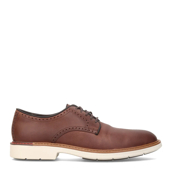 A brown leather plain toe oxford shoe with lace-up closure and welt detailing.