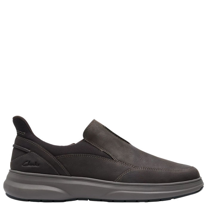 Black slip-on shoe on a white background