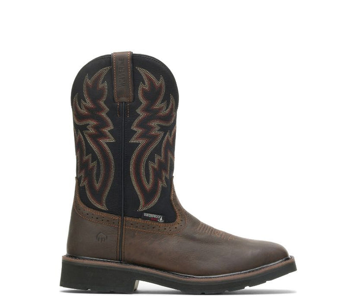 A men's rancher waterproof steel toe wellington boot in brown with a distinctive leather pattern and a steel toe cap.