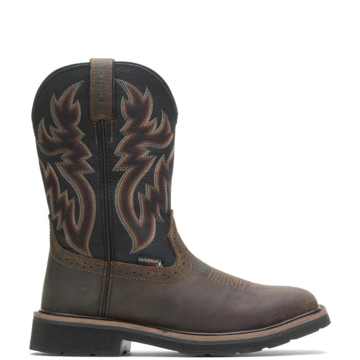 A pair of men's waterproof cowboy boots in black and brown with a floral pattern on the upper and a visible brand logo.