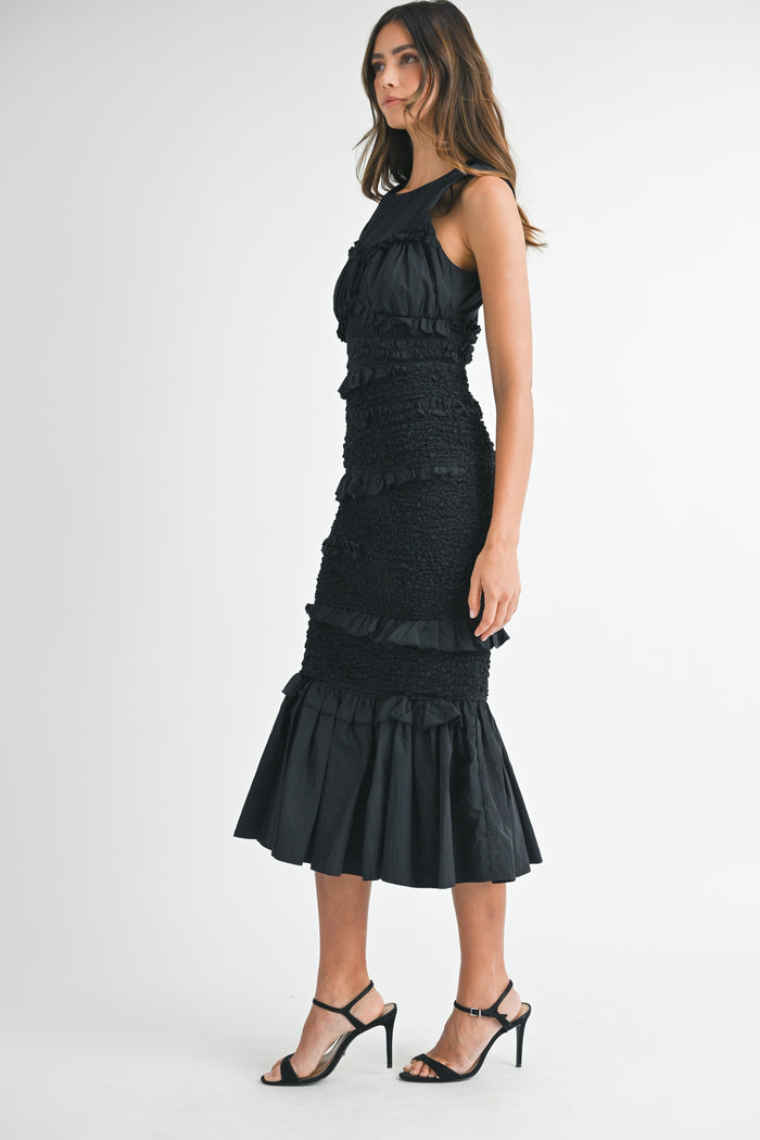 smocked black ruffled midi dress