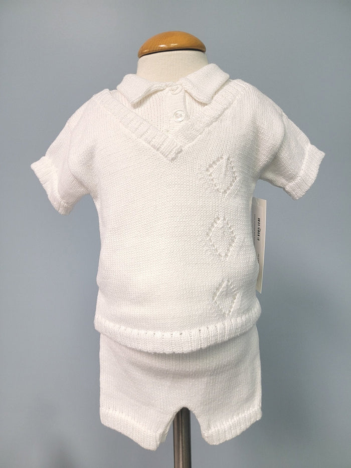 White knit baby boy outfit with vest.