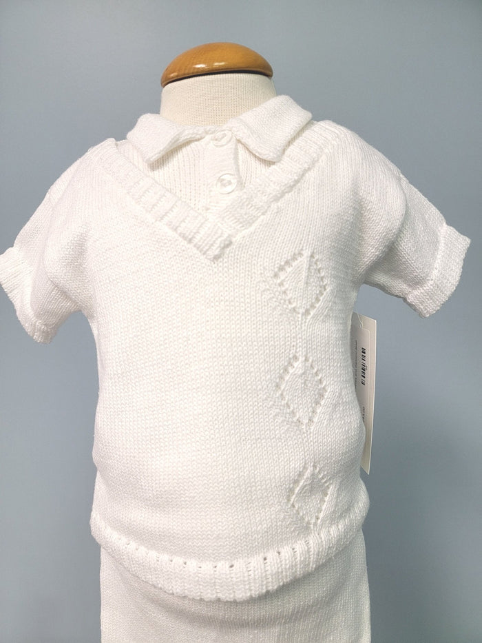 White knit baby boy outfit with vest.