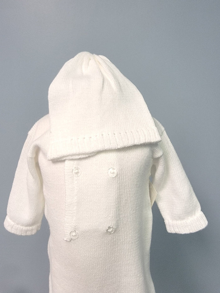 White knit baby boy romper with buttons and bonnet.