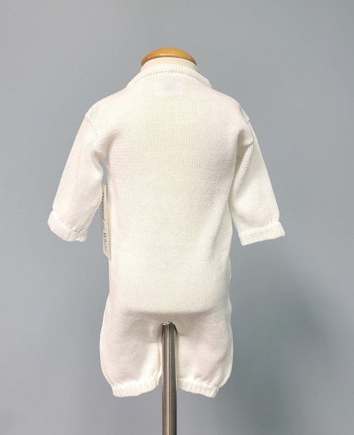 Back of white knit baby boy romper.