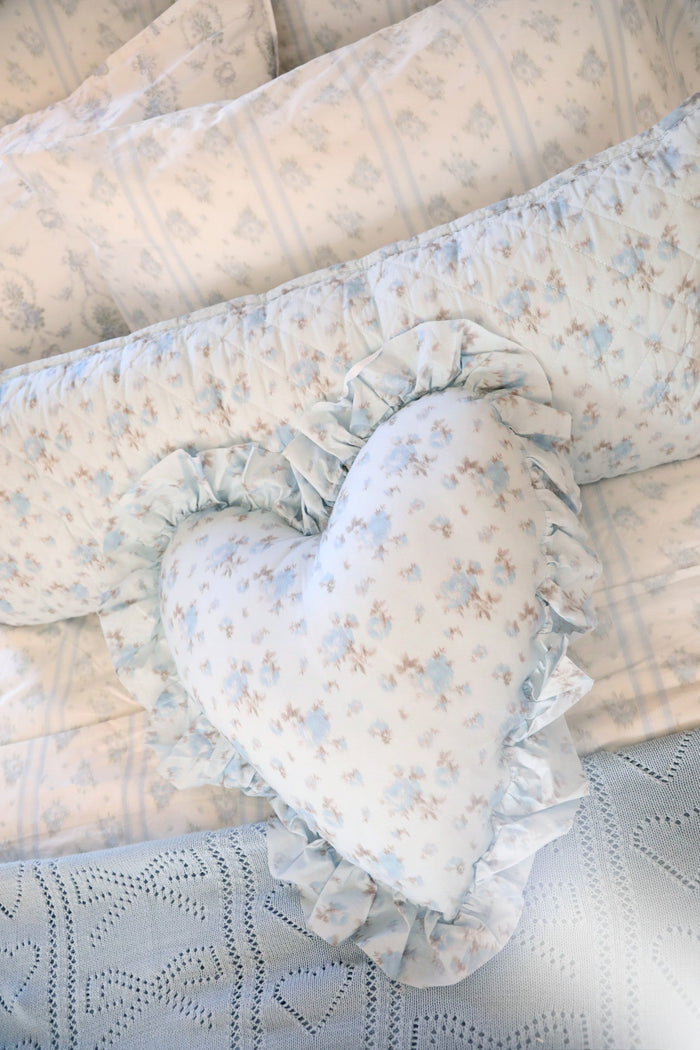 Blue, 100% cotton chic throw blanket. Featuring heart and bow-stripped pointelle details.